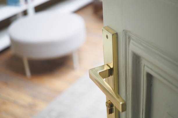 istock open door concept with Door handle and blur interior room background, 2188412901