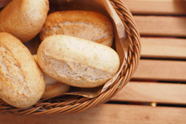 istock Enjoy Freshly Baked Delicious Bread Rolls Presented Beautifully in a Rustic Basket 2188413868