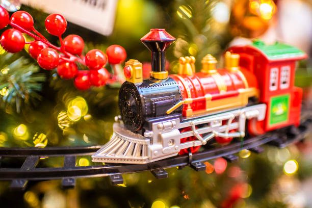 istock Christmas toy train on the Christmas tree background 2188418435
