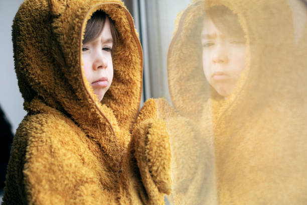 istock Portrait of a sad lonely child 2188422722