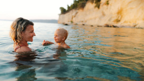 istock Swimming with mommy 2188422777