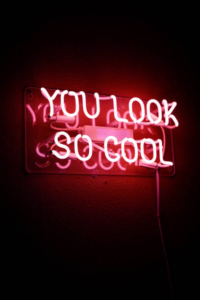 istock “You Look So Cool” Red Neon Light Up Sign On Dark Wall 2188423004