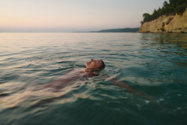 istock Swimming in the calm sea water 2188423402