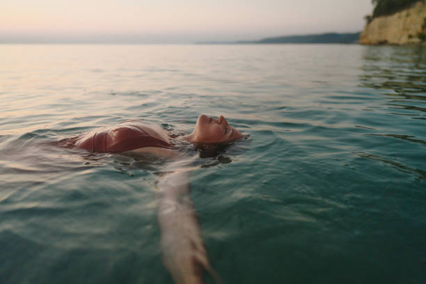 istock Swimming in the calm sea water 2188423483