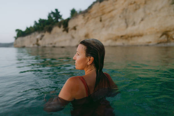 istock Swimming in the calm sea water 2188423507