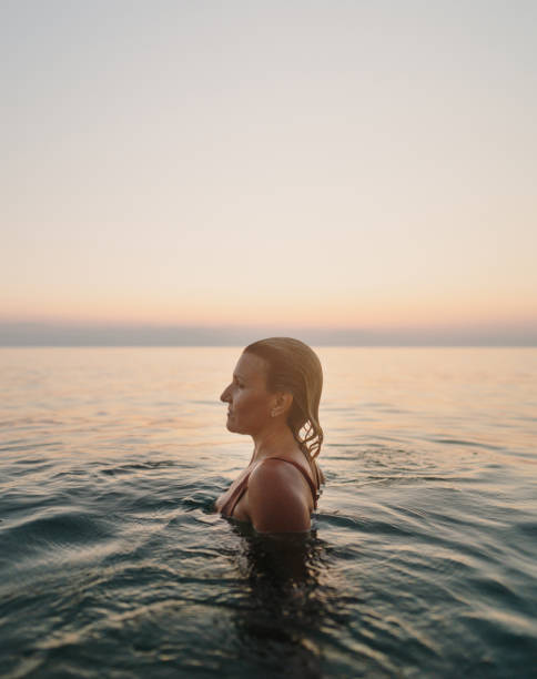 istock Swimming in the calm sea water 2188423603