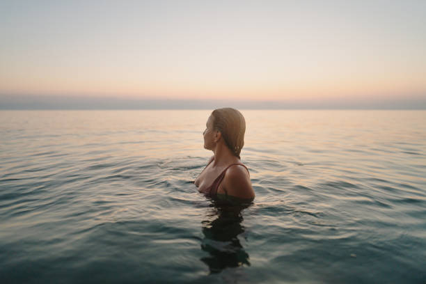 istock Swimming in the calm sea water 2188423608