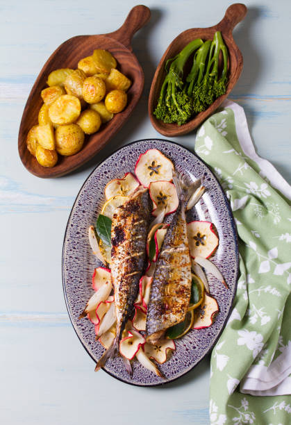 istock Grilled mackerel fish with roasted potatoes and broccoli. 2188424547
