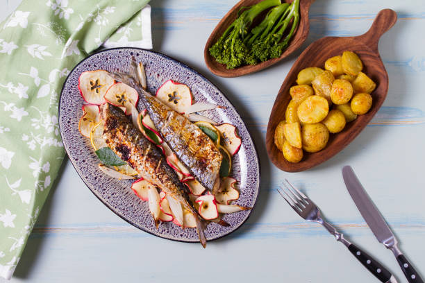 istock Grilled mackerel fish with roasted potatoes and broccoli. 2188424554