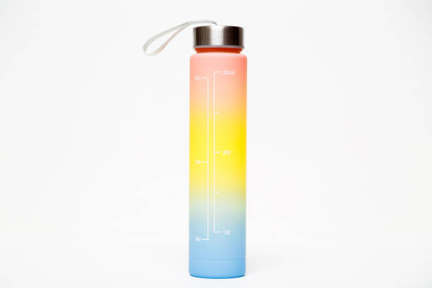 Motivational gradient water bottle with time markers and encouraging phrases on white background. Bottle with vibrant gradient design from orange to blue, with stainless steel cap and carrying strap