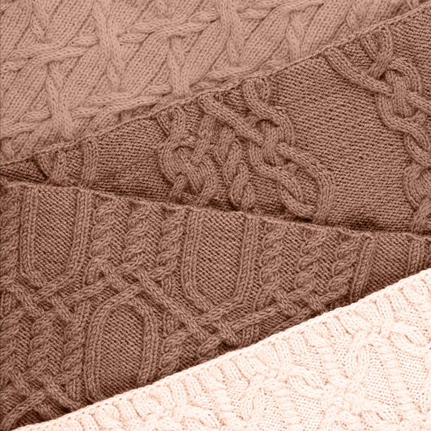 istock Knitted mocha mousse color background 2188430433