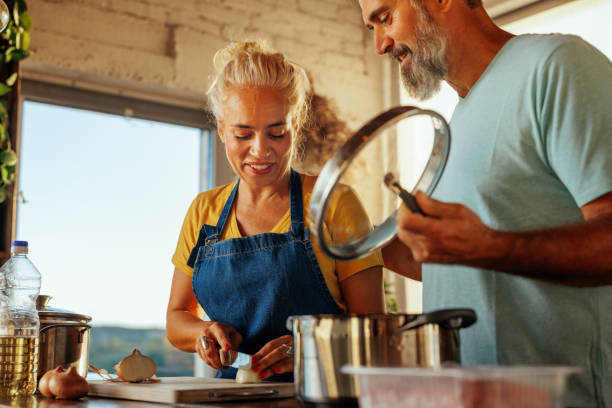Senior couple preparing to cook together.