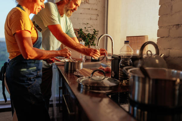 istock Caucasian retired couple cooking. 2188431020
