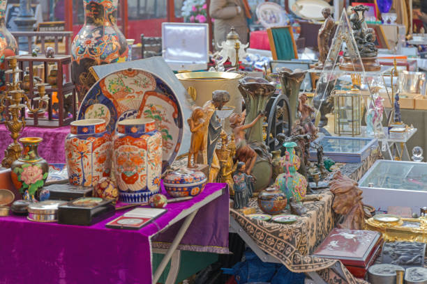 Nice, France - January 29, 2018: Second Hand Ceramics Vases Art for Sale at Brocante Antique Market Cours Saleya Old Town Winter Day.