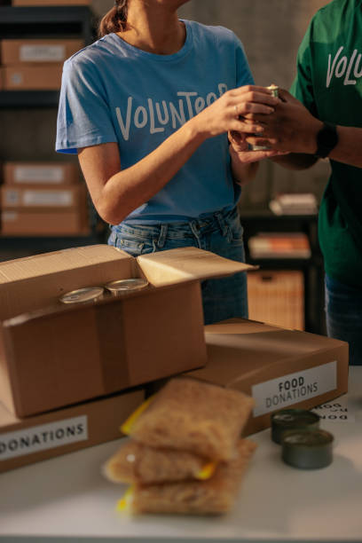 istock Volunteers collaborating on food donations 2188437778