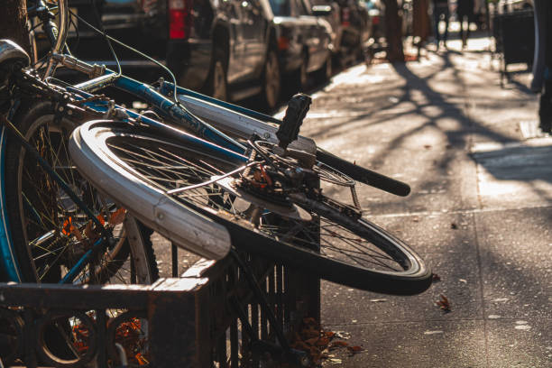 A male bicycle courier rides against the traffic in the bike lane in New York City. 