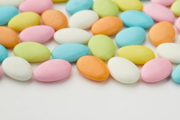 istock Traditional Easter Portuguese candies. Colorful sweets on white background. 2188442875