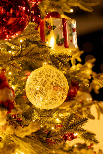 istock Creative Christmas tree with glass ornaments, and red balls. 2188448923