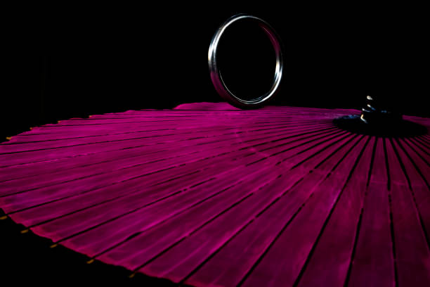 A ring running over a red Japanese umbrella