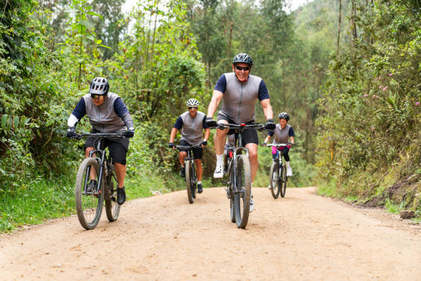 istock Happy group of people mountain biking 2188455573