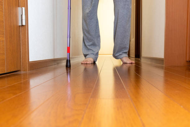 istock A person walking down a corridor with a cane 2188456346
