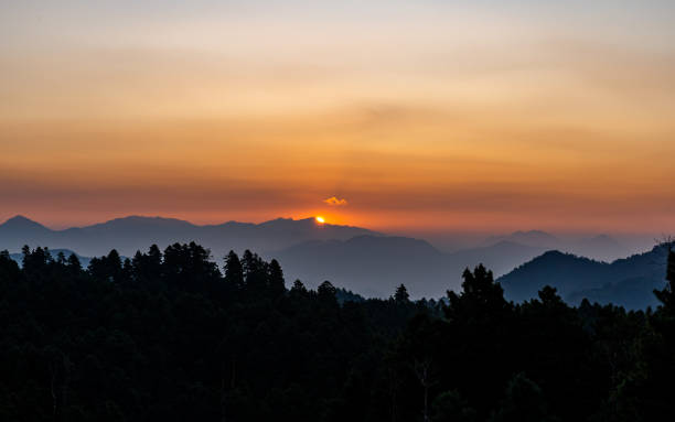 istock gloomy sunrise over the Mountain 2188456772
