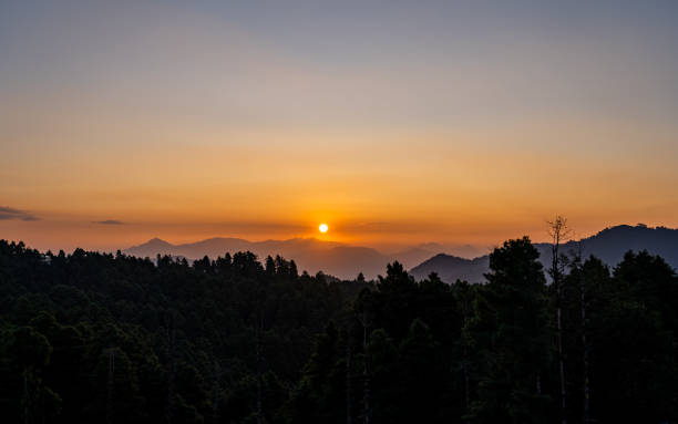 istock gloomy sunrise over the Mountain 2188456794