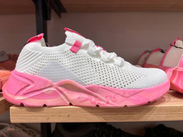istock A white and pink shoe with a pink stripe on the side 2188458482