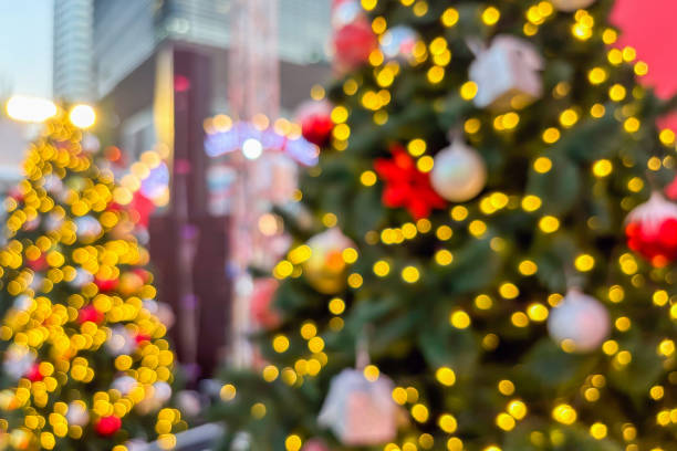 istock Abstract Christmas holiday with festive gold bokeh light on Christmas tree blurred background 2188462912