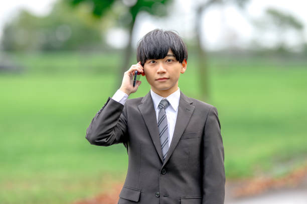 istock Business man and phone 2188469826