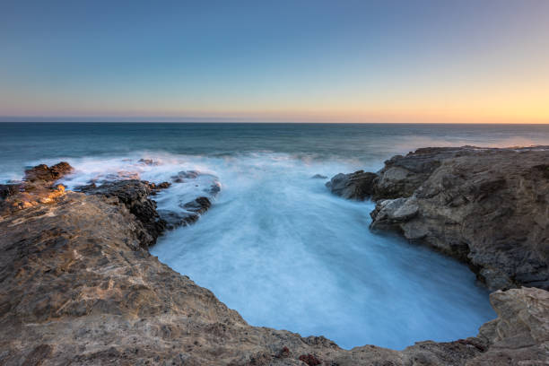 istock Waves crash on Leo Carrillo's rocks 2188474678