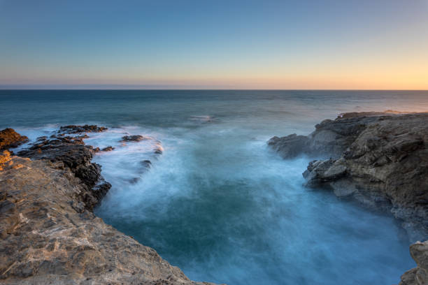 istock Sunset over the ocean waves at Malibu beach 2188474686