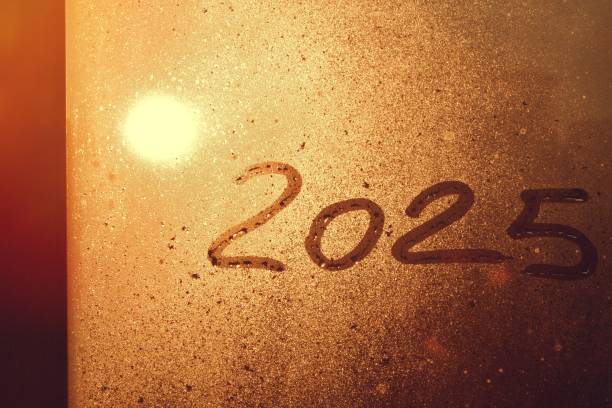 istock Sunrise with a window sign 2025 New Year celebration concept. 2188476721