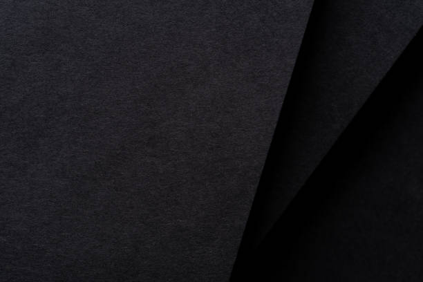 istock Background of overlapping black construction paper 2188477213