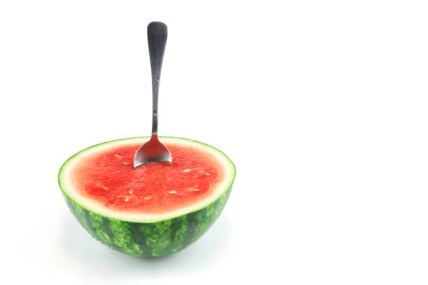 eaten watermelon and spoon isolated on white background