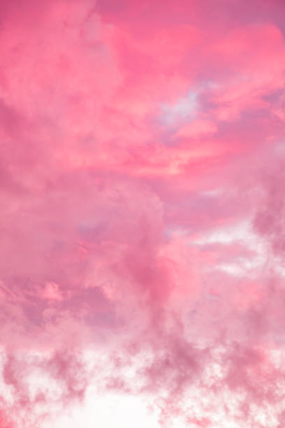 istock Fairytale sky with sugar cotton pink clouds in a dreamy background. Fantasy environment. Amazing heaven. Nature wallpaper. Idyllic backdrop. Romantic atmosphere. Textured abstract. High quality photo 2188480937