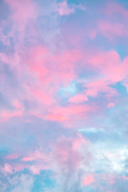 istock Fairytale sky with sugar cotton pink clouds in a dreamy background. Fantasy environment. Amazing heaven. Nature wallpaper. Idyllic backdrop. Romantic atmosphere. Textured abstract. High quality photo 2188481115