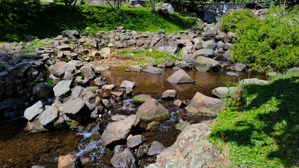 istock Creek with Stones and Flowing Water 2188482765