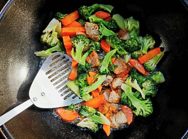 istock Cooking Stir fried Vegetables - Thai food preparation. 2188483189