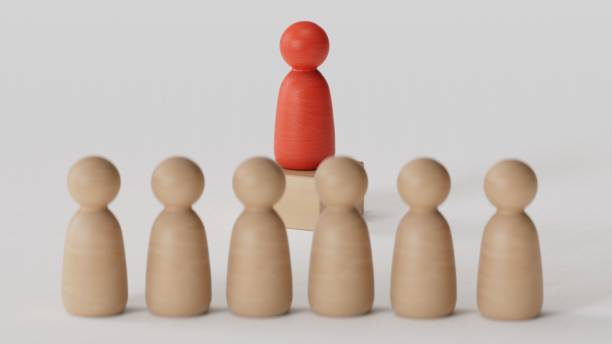 istock Wooden person model among people, Leadership concept.3D rendering on white background. 2188483921