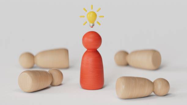 istock Wooden figure with drawing light bulb on cube among other wooden with question mark , Problem solving and creative idea concept.3D rendering on white background. 2188484156