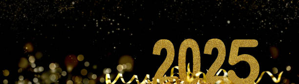 istock 2025  new year on abstract  night in ribbon and glliter 2188484822