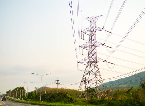 istock High voltage pole electric grid line energy tower tranmission high pylon voltage substation cable network plant industry technology construction green energy power supply wires ecosystem change. 2188485343