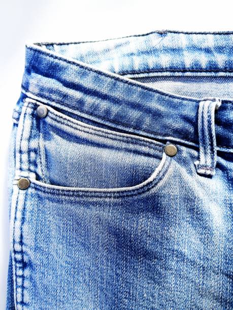 Fashionable leather belt and jeans top view.
