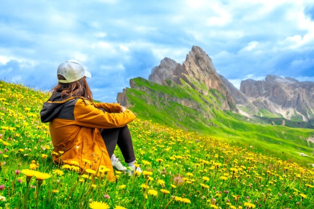 istock Tourist enjoying seceda peaks in the dolomites during summer 2188488911