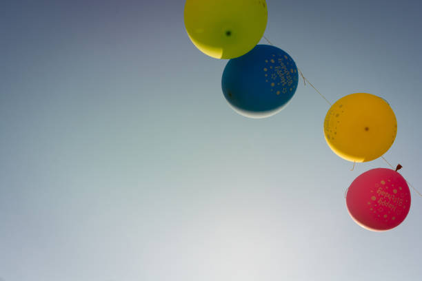colorful balloons on a blue sky background