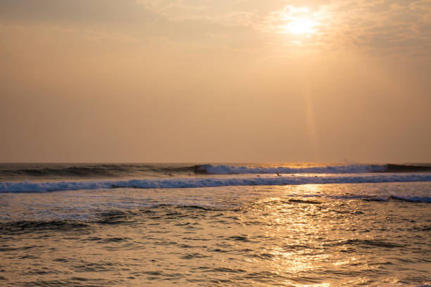 istock The ocean is calm and the sun is setting, creating a peaceful and serene atmosphere 2188489357