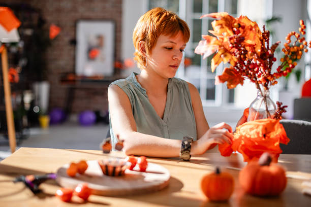 istock Crafting autumn-themed centerpiece with vibrant colors 2188491684
