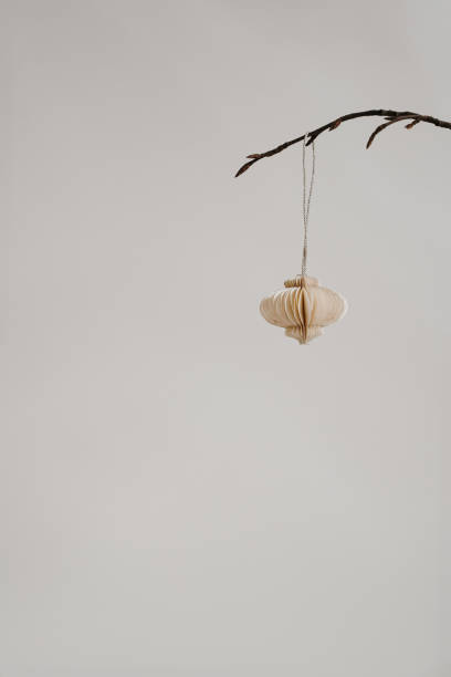 istock Minimalist Paper Ornament on Bare Branch 2188491782