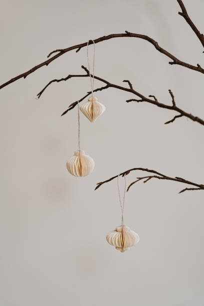 istock Paper Ornaments Hanging on Branches 2188491919